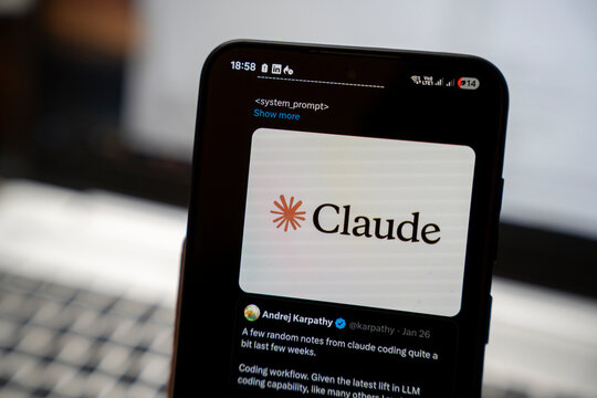 Warsaw, Poland - Feb 3, 2026: A smartphone displaying the Claude logo on its screen, showcasing advancements in AI technology and innovation in mobile applications.