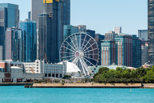 Navy Pier&rsquo;s Centennial Wheel with Chicago&rsquo;s skyscrapers in the background on a clear, blue summer day. Copy space is in the image.