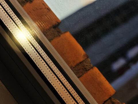 Sun flare on window glass interior background