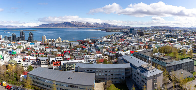 Panoramic view of Reykjavik city with colorful houses and Mount Esja in Iceland.