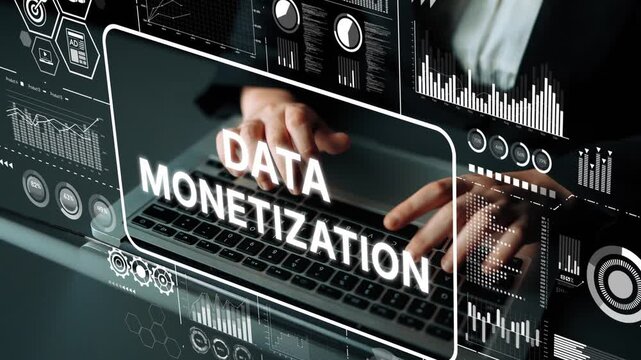 Professional hands typing on laptop keyboard with data monetization graphics and analytics in modern business concept. Asymptotic smart data analytic.