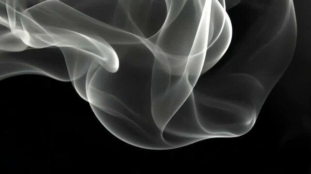 White smoke swirling on a black background, abstract misty texture.
