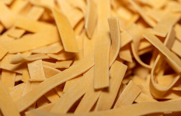egg noodles macro background close up