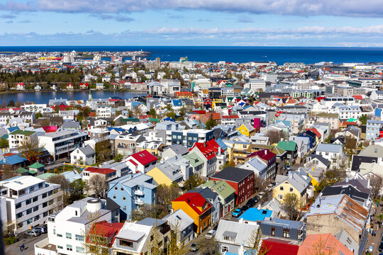Colorful Reykjavik Cityscape with Tjornin Lake and Ocean View.