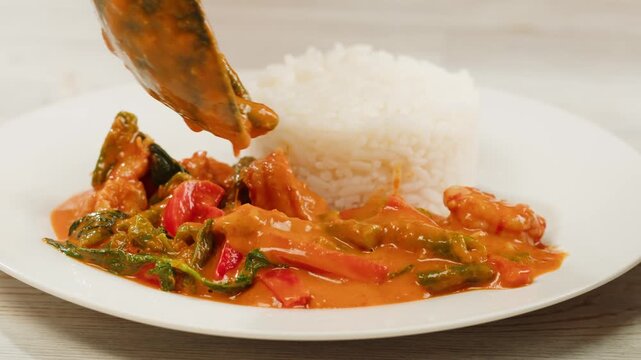Tamarind red prawn curry cooking, shrimps in tomato ginger sauce, asian kitchen, Chinese restaurant.