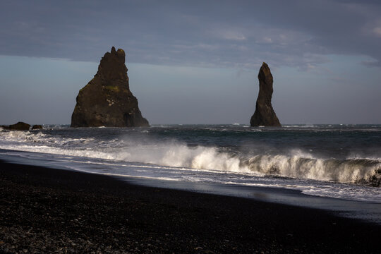 Reynisdrangar sea stacks Langsamur and Landdrangur on Reynisfjara Black Sand Beach, Iceland