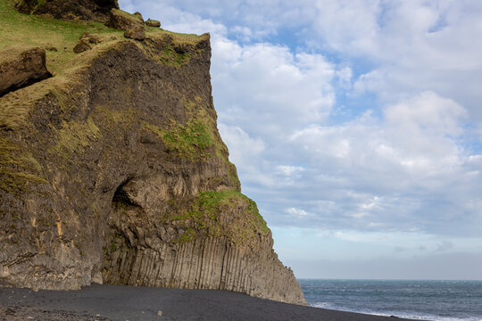 Hexagonal basalt columns at Halsanefshellir Cave on Reynisfjara Black Sand Beach, Iceland