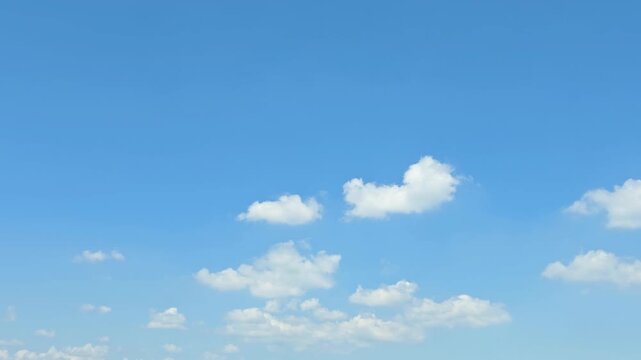 Cloudscape, Timelapse of beautiful Blue sky with white cumulus clouds drifting in bright daylight, for background	