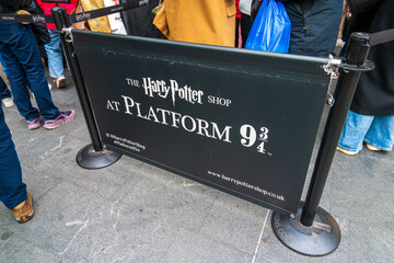 Obraz premium Sign for Platform 9 and three quarters at King's Cross Station in central London from the Harry Potter books