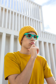 Thoughtful university student in casual attire