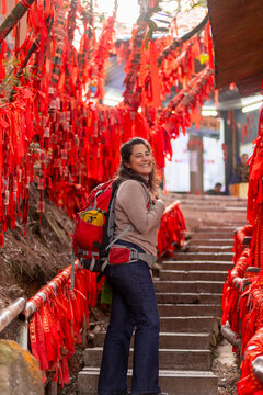 Woman exploring vibrant Zhangjiajie National Forest Park