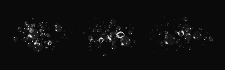 Realistic oxygen bubbles in water on a black background with fizzy sparkles and effervescent style. 