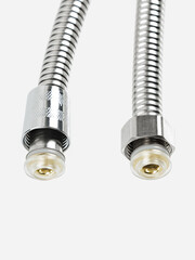 Flexible shower hose close-up. Metallic, chrome-plated, shiny.