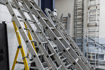 Aluminium Ladders Stored in Facilities Management Warehouse © Tosh Lubek