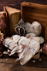 Still life with vintage style handicraft heart decors
