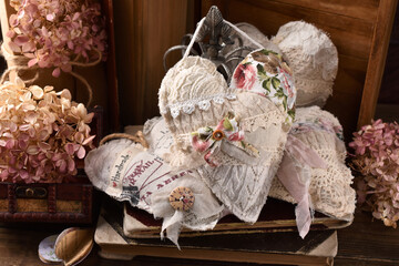 Still life with vintage style handicraft heart decors