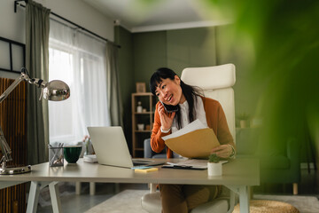 Woman multitasking while working from home office