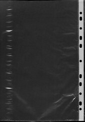 Textura plastica. Plastic film wrap texture background. transparent plastic film wrap overlay texture background. Textura de pl&aacute;stico. sobre fondo negro