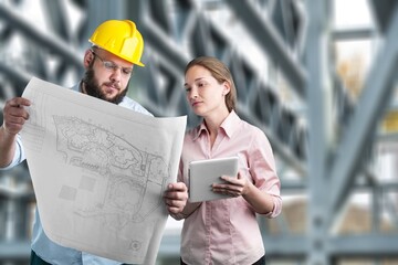 Construction Engineering worker discusses plan the building