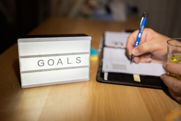 Man outlining goals and planning future strategy