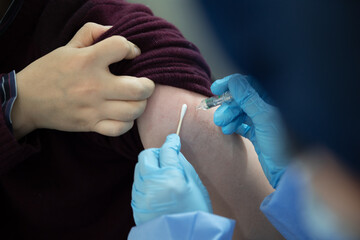 The adult are getting vaccinated.