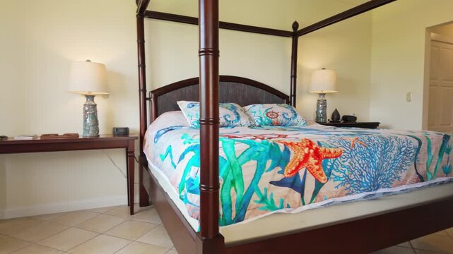 master suite featuring a large four-poster canopy bed with nautical decor