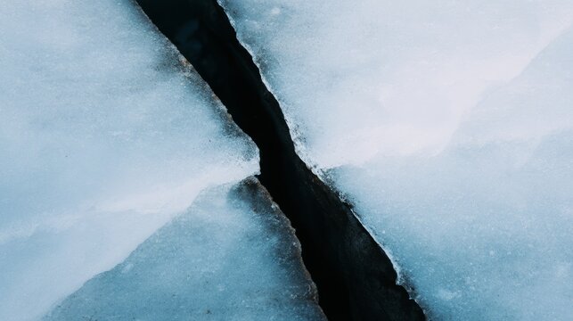 uriel. Aerial view of a deep lightning-shaped crack splitting a smooth glacier surface. travel magazines, destination branding, designed for travel destination branding, used by lab technicians.
