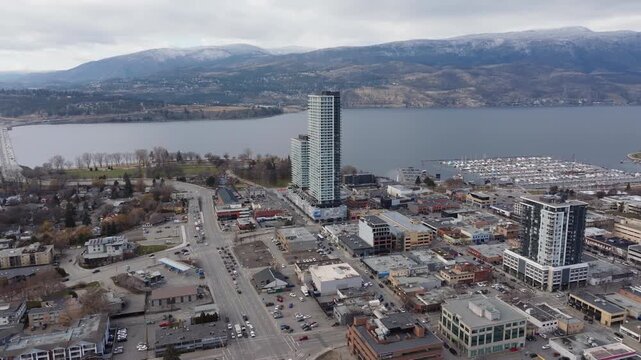 Drone of traffic in a downtown area by the lake in the mountains