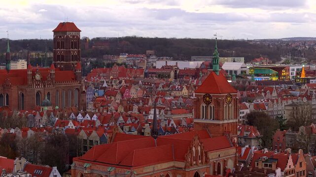 Aerial view flying over the historic old town of gdansk, poland. Beautiful cityscape featuring st. Mary's church and st. John's church