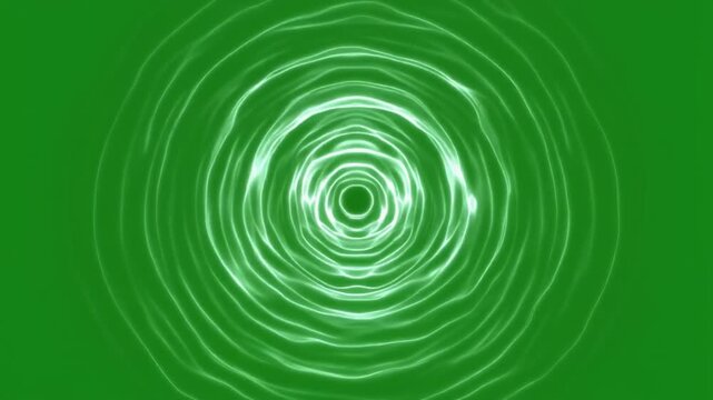 Expanding green light ripples form concentric wave patterns