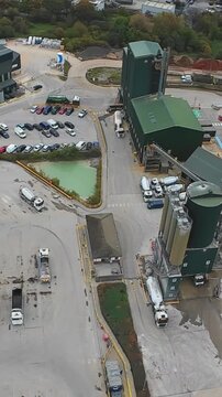 Vertical Screen, Leeds, UK Thorough Aerial View Highlighting Entry Locations And Vehicle Pathways From Above. Extensive Highaltitude Illustration Showcasing Site Entrances And Car Circulation Areas