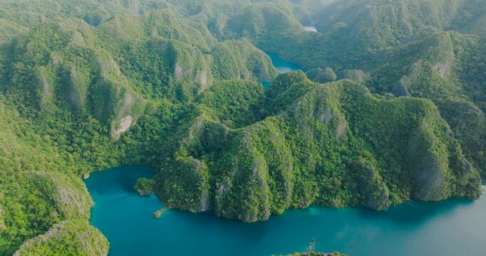Aerial view of mountain lakes with limestone rocks. Kayangan Lake. Banuang Daan Lake. Coron, Palawan. Philippines.