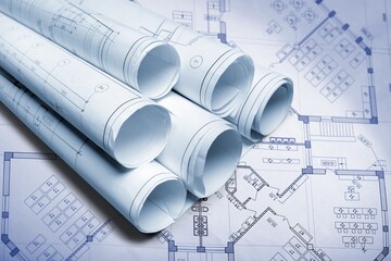 Rolls of paper architectural drawings blueprints