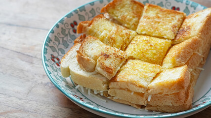 Roti Bakar Keju, toasted brioche loaf with grated cheese