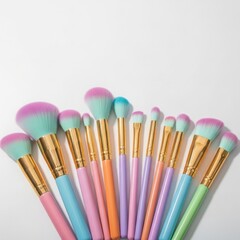 Collection of colorful makeup brushes isolated on white background