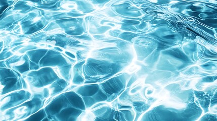 Clear blue water surface with shimmering sunlight reflections