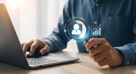 Person analyzing data on laptop with magnifying glass