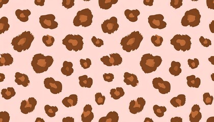 Obraz premium A vibrant seamless pattern featuring brown and tan animal print spots scattered over a soft pink background