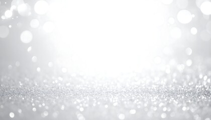 A soft, shimmering, and glowing background of white and silver sparkle with a focus on the lower portion for a dreamy effect
