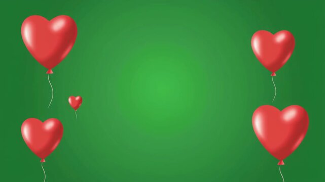 Heart-shaped balloons on strings against a green background