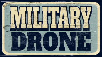 Aged and worn military drone sign on wood