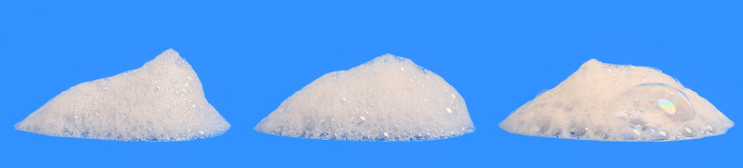 set liquid white foam soap, shampoo, or shower gel. Abstract bubbles. isolated on blue background. Clean concept, cosmetic visuals for a suds product. realistic soap texture with detailed bubble