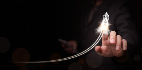 Growth concept. Hand draws launching up rocket. Growing success, startup strategy, innovation, project launch, technology expansion, emerging economy, breakthrough solution, and successful outcome.