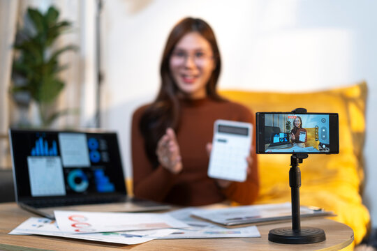 Woman live streaming financial advice online course