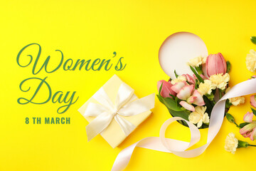 Obraz premium Colorful flowers and a gift box celebrate womens day