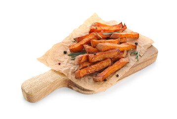 Wooden board with tasty cooked sweet potato, rosemary and peppercorns on white background