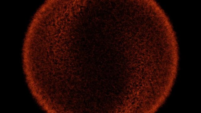 Red textured object transitions from dark to light on black surface
