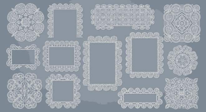 Collection of intricate white lace frames and decorative elements on a textured blue background.