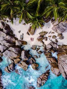 Discover the serene beauty of Anse Patates on La Digue, Seychelles, a tropical paradise getaway