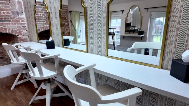 Empty Makeup Room Interior With White Chairs Mirrors And Brick Wall Featuring A Clean And Organized Space For Beauty And Styling Services
